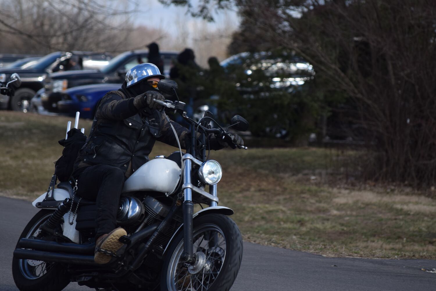 PHOTOS: Thousands of Outlaws attend motorcycle gang leaders funeral at Montgomery County Fairgrounds.