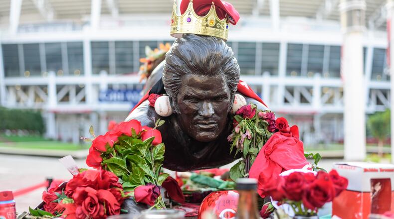 Here’s a look at fan tributes at Cincinnati Reds legend Pete Rose’s statue outside Great American Ball Park on Saturday morning, Oct. 5, 2024. Major League Baseball’s all-time hits leader with 4,256, passed away at the age of 83 on Sept. 30, 2024. Rose also played in 1,972 games in which his team won, making him the most winning athlete in the history of professional sports. TOM GILLIAM / CONTRIBUTING PHOTOGRAPHER