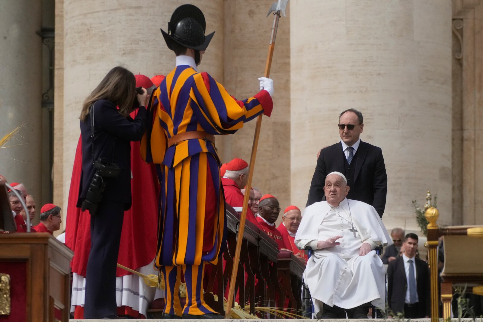 Pope Francis arrives at the end of the mass on Palm Sunday in St. Peter's Square at The Vatican, Sunday, April 13, 2025. (AP Photo/Gregorio Borgia)