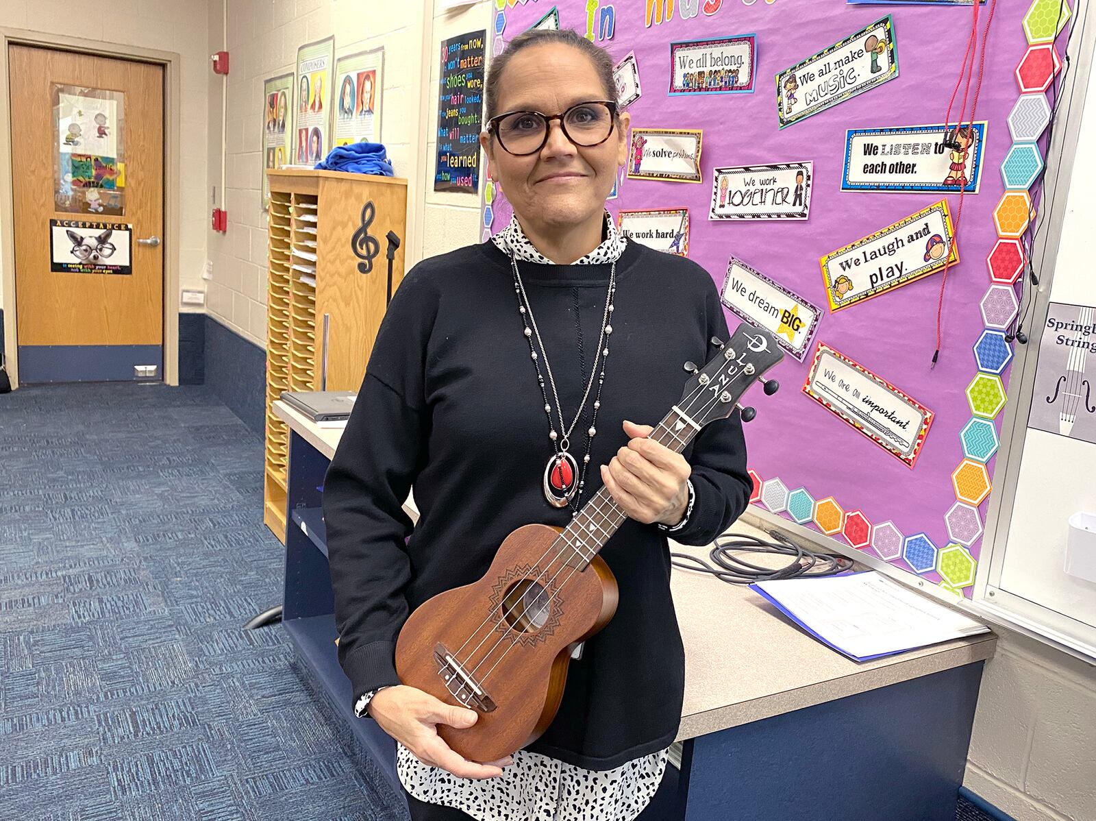Larissa McIntosh, sixth grade choir and strings teacher at Springboro Intermediate School, organized a fundraiser to purchase ukuleles for her choir students to learn and play. CONTRIBUTED PHOTO / SCOTT MARSHALL