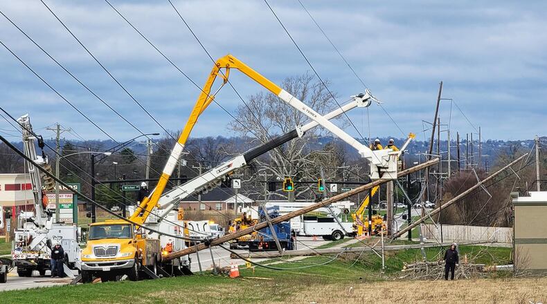 High winds knocked down large poles on Princeton Road in Fairfield Twp. on Friday, March 26, 2021. NICK GRAHAM / STAFF