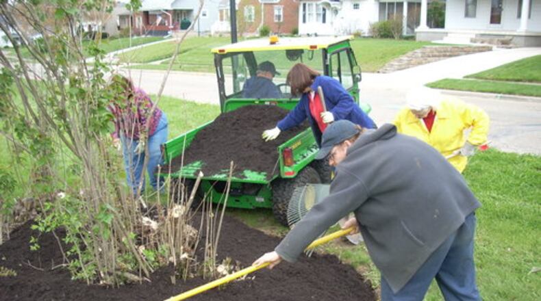 As a part of the City’s Arbor Day celebration the City of Middletown and Keep Middletown Beautiful are giving away free trees to help build and strengthen the city’s tree canopy. Spreading mulch at Sunset Park are Carolyn Keiffer of the city Tree Commission, residents Debbie Grant, and Kay Fraley as well as Kevin McCloud, a seasonal park maintenance employee. They were participating in the Earth Day work day to revitalize Sunset Park on April 22, 2009. FILE ART