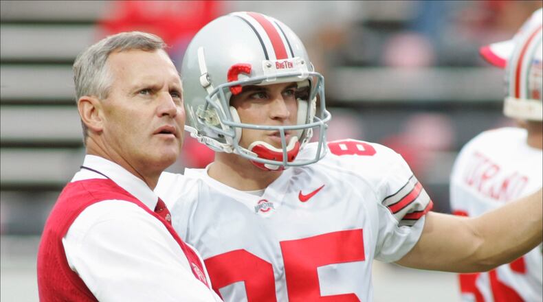 RALEIGH, NC - SEPTEMBER 18:  Head coach Jim Tressel of the Ohio State Buckeyes talks with kicker Mike Nugent #85 during the game against the North Carolina State Wolfpack on September 18, 2004 at Carter-Finley Stadium Stadium in Raleigh, North Carolina. (Photo by Grant Halverson/Getty Images) *** Local Caption *** Jim Tressel;Mike Nugent