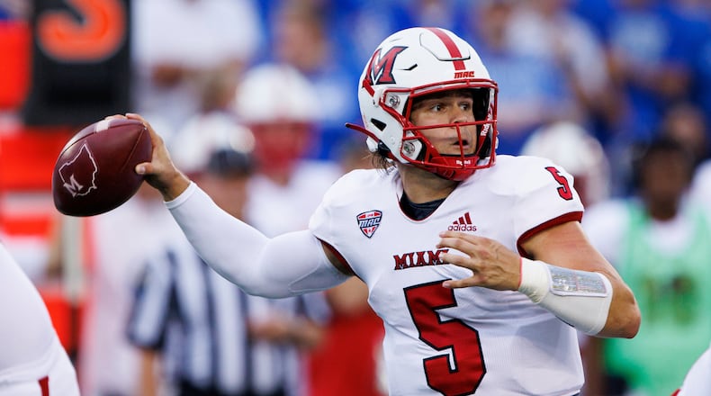 Miami (Ohio) quarterback Brett Gabbert throws a pass during the first half of an NCAA college football game against Kentucky in Lexington, Ky., Saturday, Sept. 3, 2022. (AP Photo/Michael Clubb)