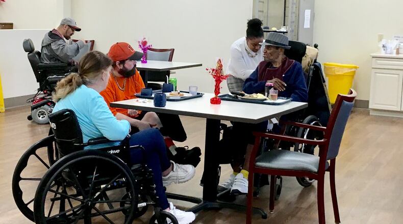 New Butler County Care Facility Administrator Chamika Poole interacts with residents at the home.