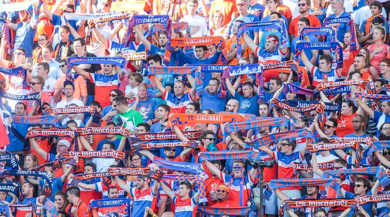 Fans cheer on the FC Cincinnati team as they play English Premier League team Crystal Palace in a friendly match Saturday, July 16, 2016 at Nippert Stadium in Cincinnati. NICK GRAHAM