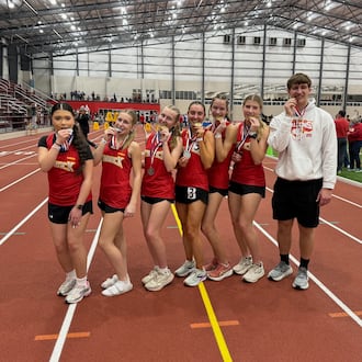 These seven Fenwick High School students medaled Saturday at the state indoor track and field championship in Geneva. From left: Lulu Hong, Lucy Tipton, Hailey Yontz, Makenzie Fallon, Sophia Tebbe, Sam Long and Ben Abbott. SUBMITTED PHOTO
