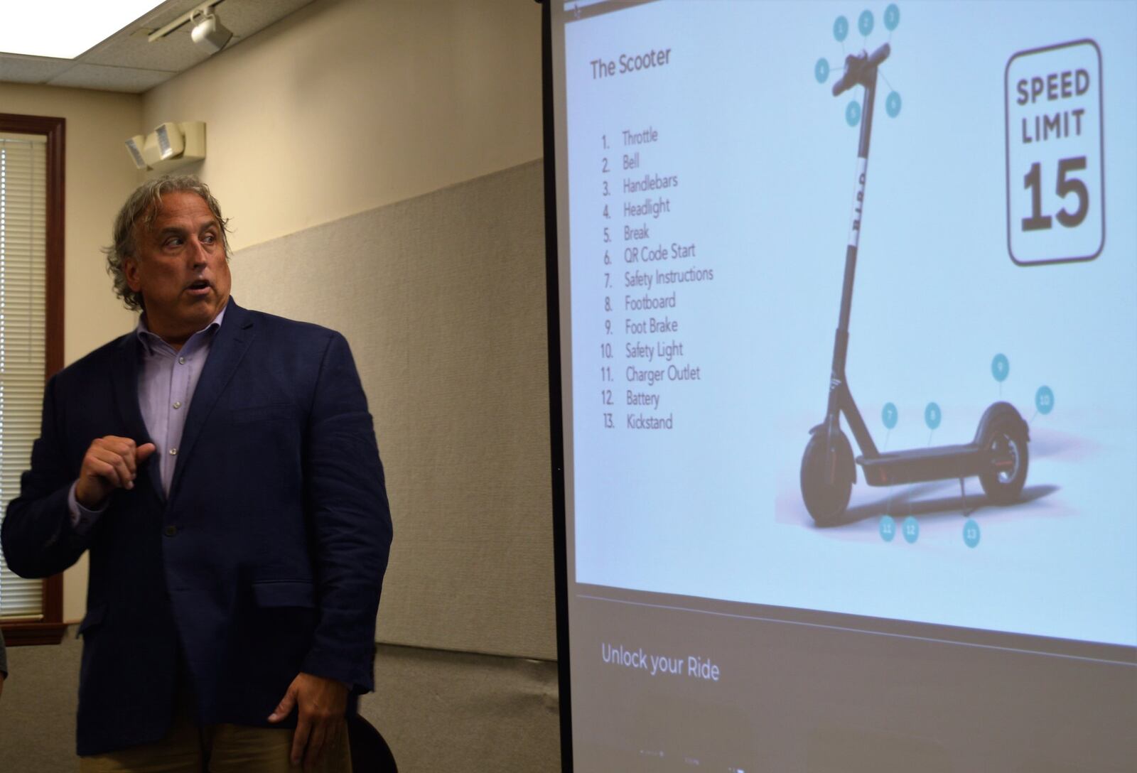 Jeremy Lynch, of Bird, speaks to an audience at the Sept. 21 meeting of the Student Community Relations Commission about the company s e-scooters they plan to bring to Oxford. 