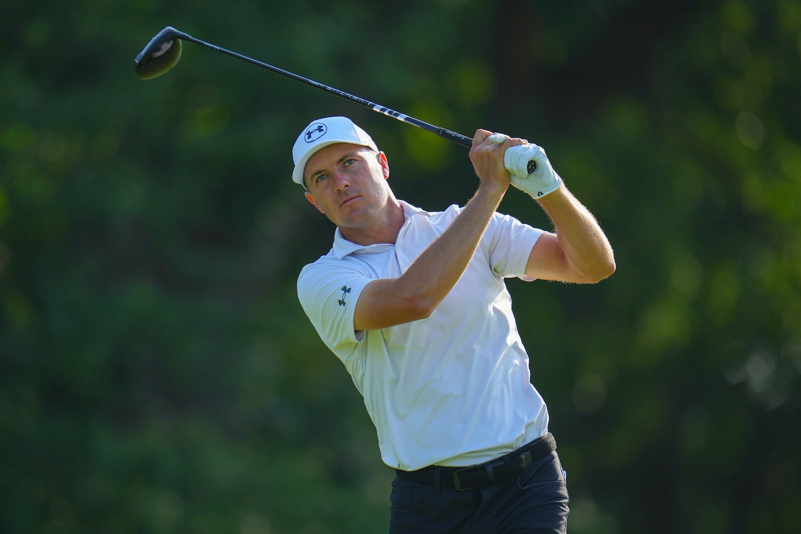 Jordan Spieth watches his tee shot on the 12th hole during the first round of the Charles Schwab Challenge golf tournament at Colonial Country Club in Fort Worth, Texas, Thursday, May 22, 2025. (AP Photo/Julio Cortez)