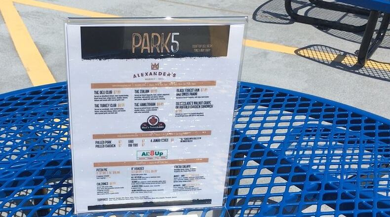 Hamilton’s Park5 area, atop the city’s McDulin parking garage, has menus for three local eateries. MIKE RUTLEDGE/STAFF Hamilton’s Park5 area, atop the city’s McDulin parking garage, has menus for three local eateries. MIKE RUTLEDGE/STAFF