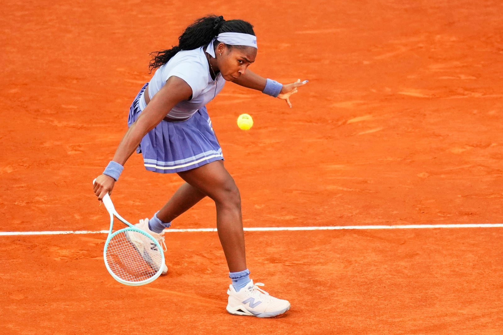 United States' Coco Gauff returns to Aryna Sabalenka of Belarus during the Madrid Open tennis final in Madrid, Spain, Saturday, May 3, 2025. (AP Photo/Jose Breton)
