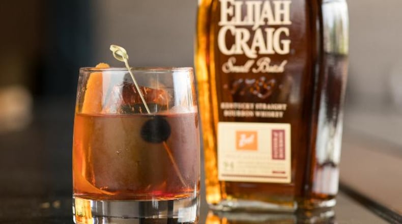 July 19, 2018 - Marietta, Ga: Zeal restaurant's signature drink the Zeal Old Fashion is shown with a bottle of Elijah Craig's small batch kentucky straight bourbon whiskey Thursday, July 19, 2018, in Marietta, Ga. This is part of a Q&A on Zeal restaurant owner and chef Scott Sawant about his upcoming participation in the Taste of Atlanta in October. This is scheduled to run in the 2018 September issue of Living Northside. (JASON GETZ/SPECIAL TO THE AJC)