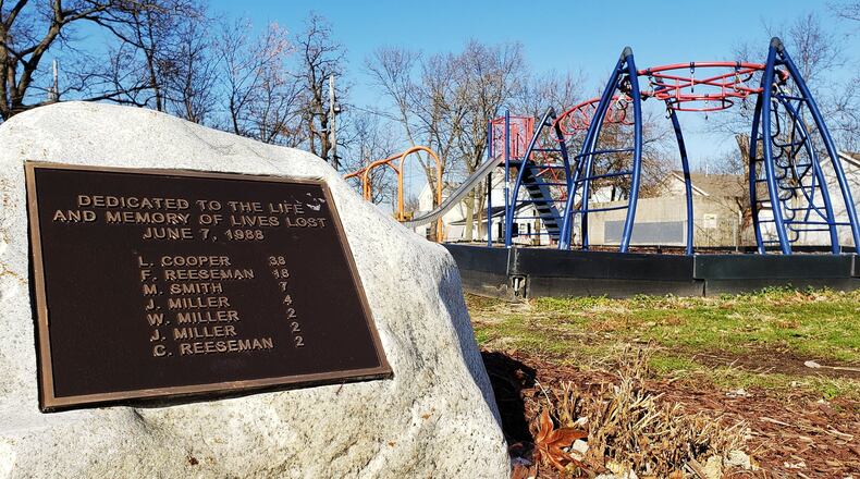 A memorial plaque was installed late last year at John R. Moser Park in Hamilton’s North End neighborhood, in memory of seven people who lost their lives in a fire on June 7, 1988. Residents of the increasingly active neighborhood put up the marker to remember the deceased. NICK GRAHAM/FILE