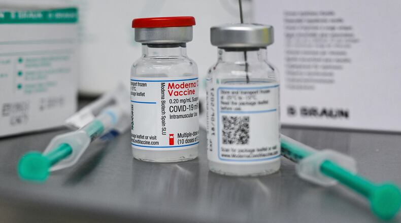 Small bottles containing Moderna's active ingredient for a Corona vaccination are pictured at the vaccination centre in Eberswalde, Germany, Wednesday, Jan. 27, 2021. (Patrick Pleul/dpa via AP)