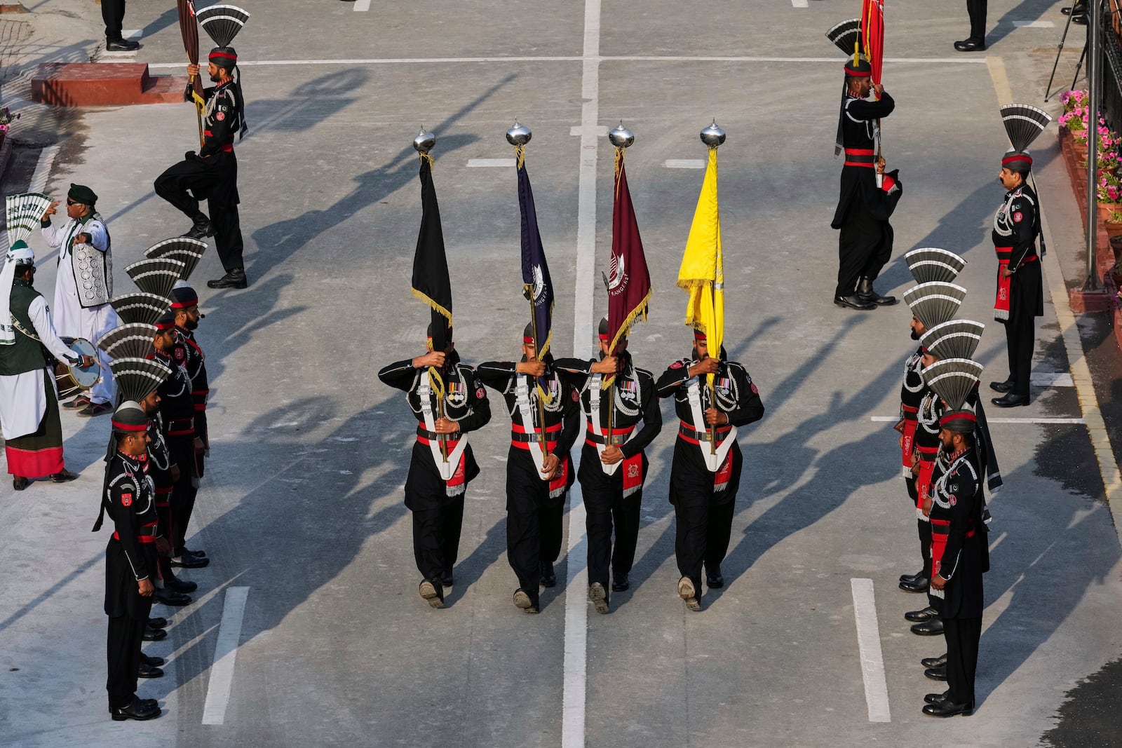Pakistan's Rangers soldiers march during a daily closing ceremony at the Wagah, a joint post on the Pakistan and India border, near Lahore, Pakistan, Monday, May 5, 2025. (AP Photo/K.M. Chaudary)
