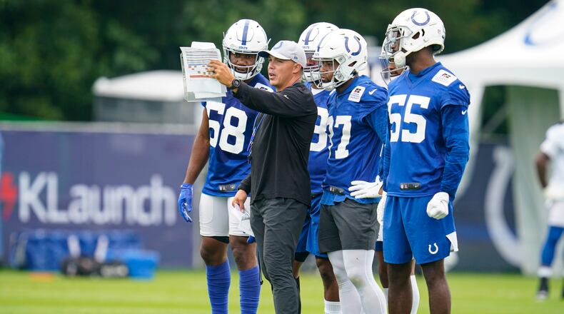 Indianapolis Colts special teams coordinator Bubba Ventrone runs a drill during practice at the NFL team's football training camp in Westfield, Ind., Wednesday, July 28, 2021. (AP Photo/Michael Conroy)