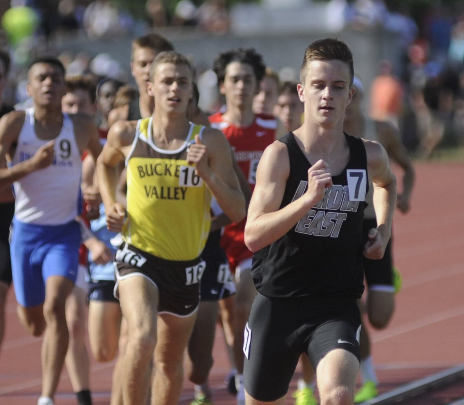 Lakota East’s Dustin Horter (right) won the 1,600 meters (4:08.38) during Saturday’s Division I state track and field meet at Ohio State University’s Jesse Owens Memorial Stadium in Columbus. MARC PENDLETON/STAFF