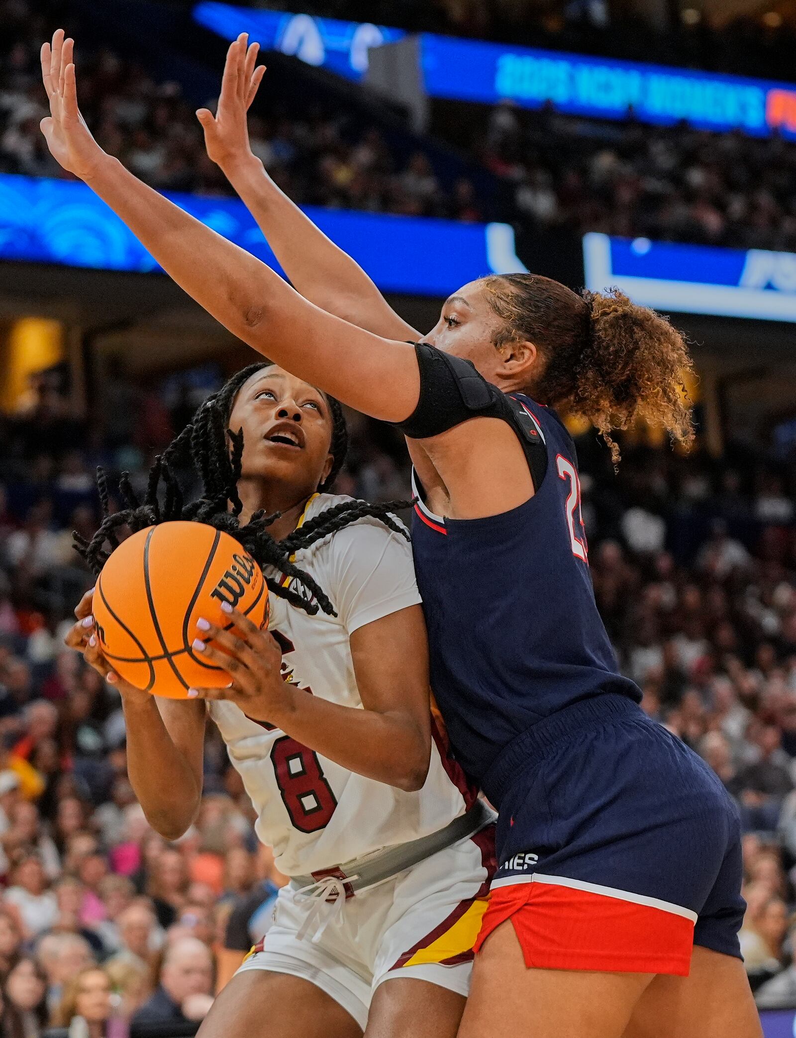 South Carolina forward Joyce Edwards (8) looks to shoot against UConn forward Ice Brady (25)of the national championship game at the Final Four of the women's NCAA college basketball tournament, Sunday, April 6, 2025, in Tampa, Fla. (AP Photo/John Raoux)