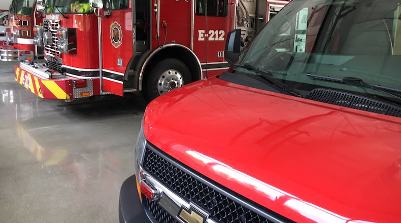 Fairfield Twp. fire and EMS vehicles parked in the apparatus bay at Station 212. ED RICHTER/STAFF
