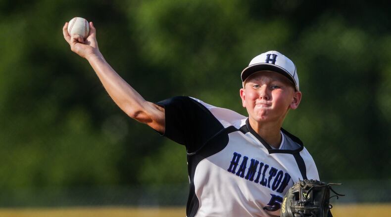 Hamilton West Side Little League’s Matt Ponatoski throws a pitch during their Ohio District 9 Little League Championship win over Anderson Township Wednesday, July 10 at the West Side Little League complex in Hamilton. West Side Little League won 17-0. NICK GRAHAM/STAFF