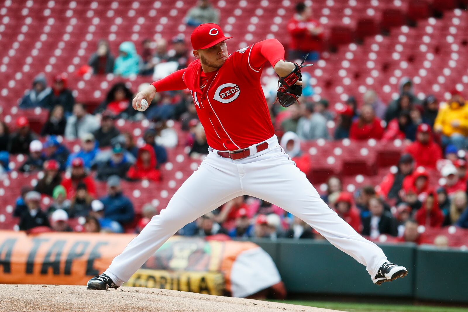 Cincinnati Reds starting pitcher Rookie Davis throws in the first inning of a baseball game against the Philadelphia Phillies, Thursday, April 6, 2017, in Cincinnati. (AP Photo/John Minchillo)