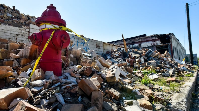 Debris still remains at the former Middletown Paperboard building after a fire in January of 2019. Middletown Division of Fire recently responded to another fire in a section of the building. NICK GRAHAM / STAFF