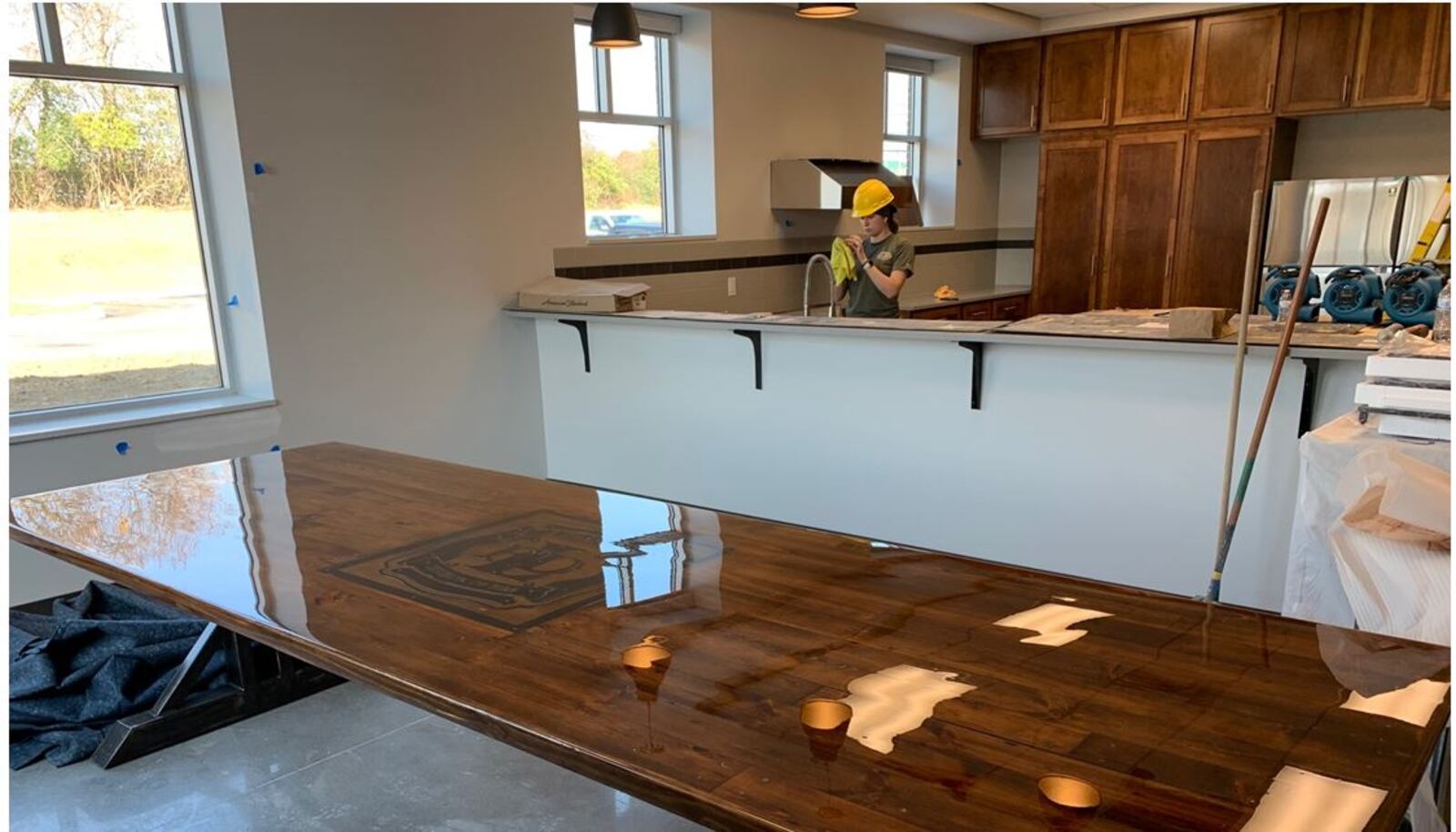 The Station 41 dining table was built from oak and metal beams from a former farmhouse. ED RICHTER/STAFF