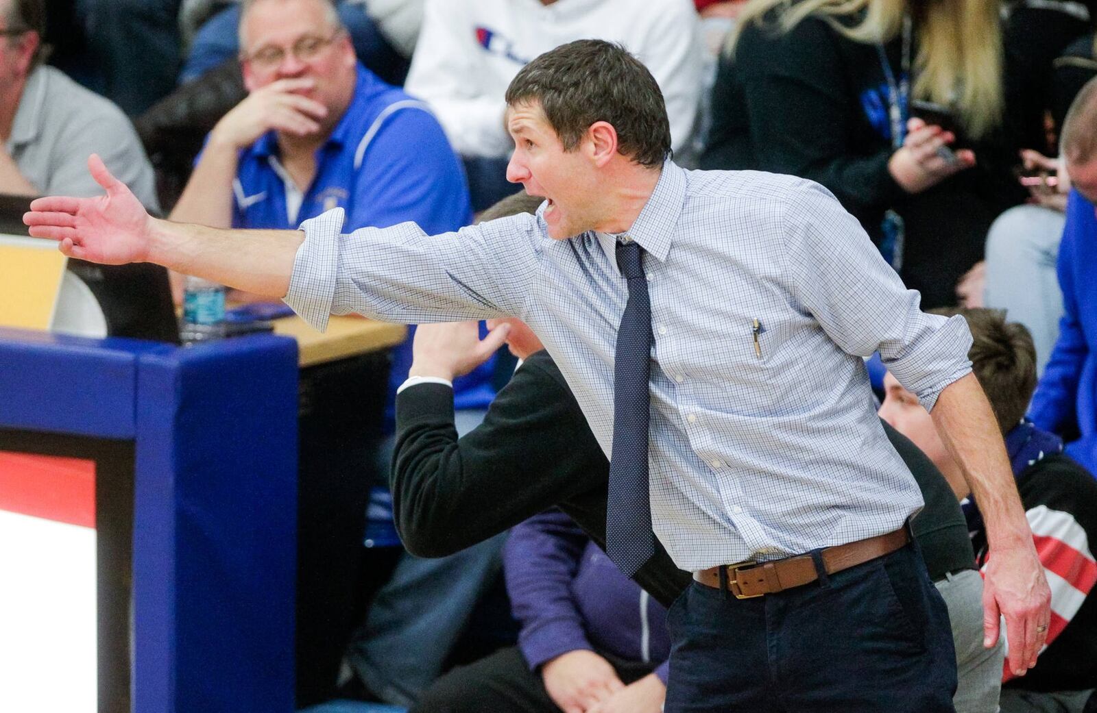 Hamilton coach Kevin Higgins makes a point during Friday night’s 58-52 win over host Northwest in season-opening play. NICK GRAHAM/STAFF