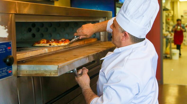 Owner and Chef Bruno Bas inside Fireside Café, which is now open at 6752 Cincinnati-Dayton Road in Liberty Twp.