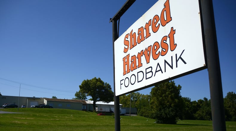 Shared Harvest Food Bank is working to sell a little more than 4 acres of land in front of its Dixie Highway building in Fairfield. The food bank, which will retain nearly 6 acres of land, will use proceeds to raise capital for the food bank, including improving their building and “help us get more funding to feed more people,” said Shared Harvest Executive Director Terry Perdue. MICHAEL D. PITMAN/STAFF