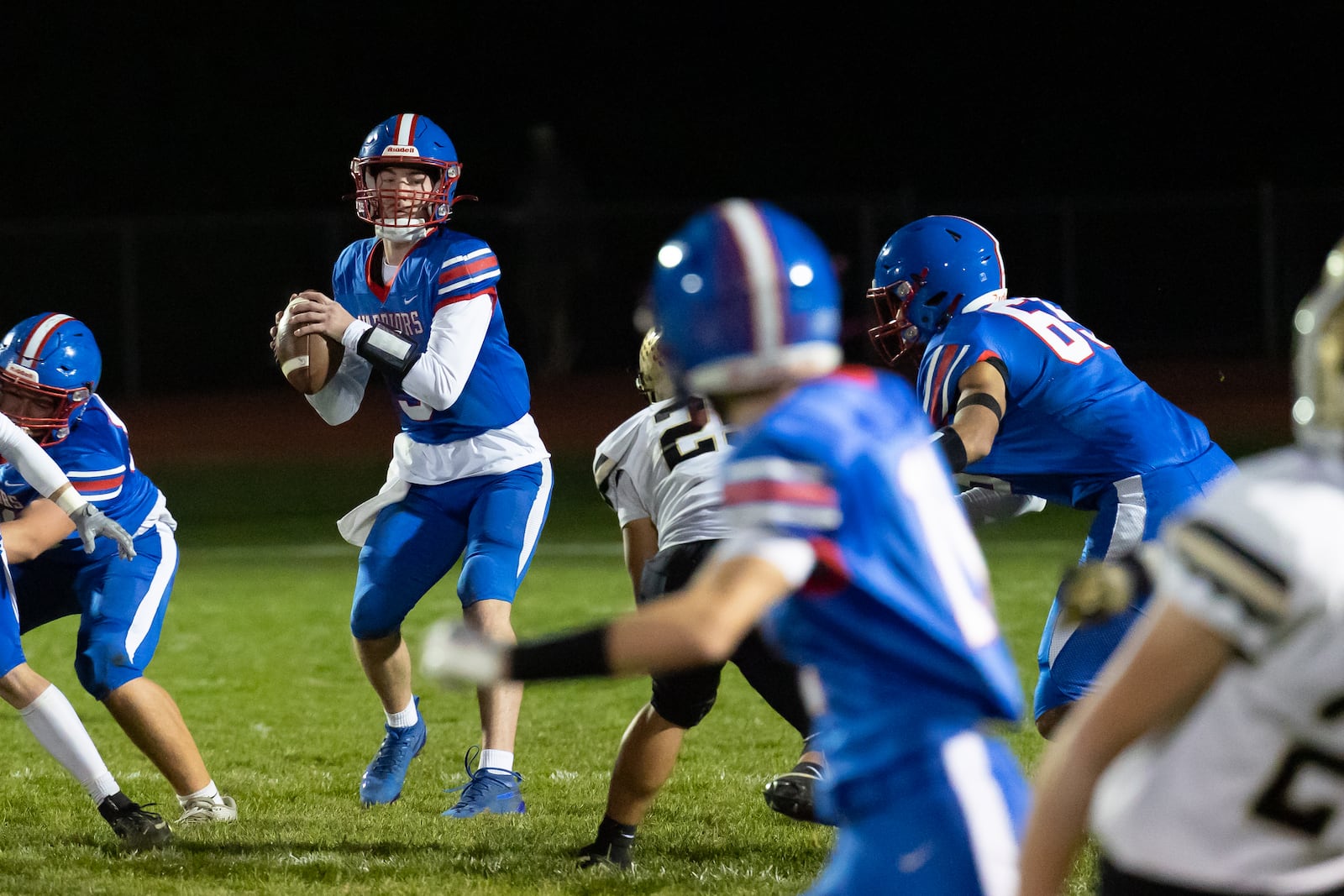 Northwestern High School senior Ried Smith prepares to throw a pass during their game against Benjamin Logan on Friday, Oct. 17 at Taylor Field in Springfield. The Raiders won 48-0. RODNEY GETZ / CONTRIBUTED PHOTO
