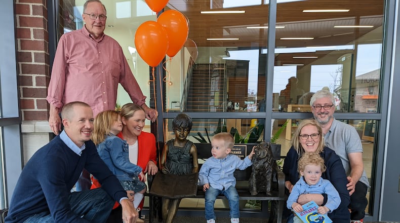 Family members of the late Shari Farmer gathered for the dedication of a bench at the Oxford Lane Library last Sunday placed in the vestibule in her memory. CONTRIBUTED