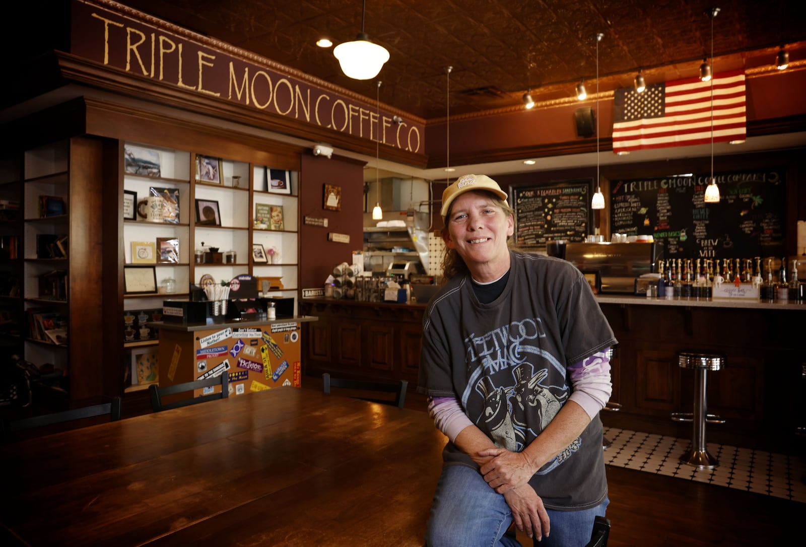 Heather Gibson, owner of Triple Moon Coffee, is celebrating 10 years in business on Central Avenue in downtown Middletown. NICK GRAHAM/STAFF
