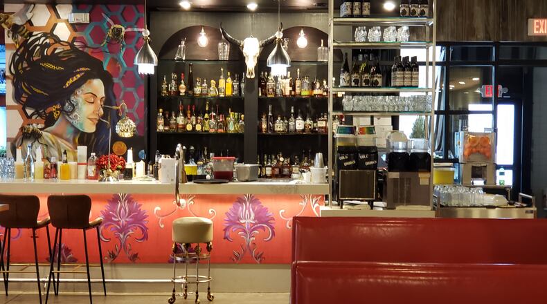 The bar at taco, tequila and bourbon hall Agave & Rye at Liberty Centerin Liberty Twp. and other Butler County businesses are bracing for the effects of a new state rule that mandates moving last call for drinks to 10 p.m. at Ohio bars and restaurants. ERIC SCHWARTZBERG/STAFF