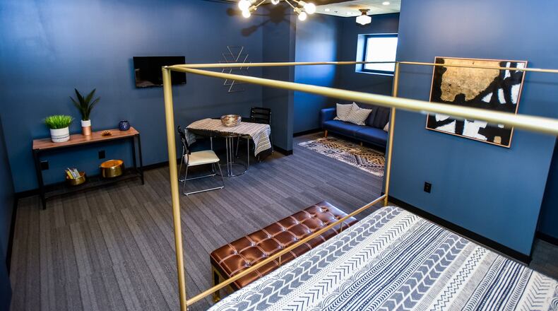 A new boutique hotel is open in downtown Middletown. Indigo Pass occupies the fourth floor of the 38,000-square-foot Torchlight Pass building at 1131 Central Ave. It has already attracted guests from Indianapolis, Seattle and Albuquerque. NICK GRAHAM/STAFF