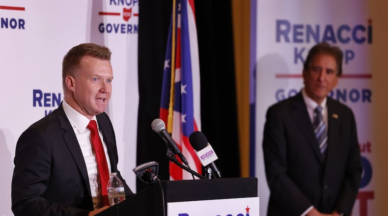 Springboro filmmaker Joe Knopp talks to around 100 people on Thursday, Dec. 2, 2021, at the Savannah Center in West Chester Twp. during the announcement of being Ohio gubernatorial candidate Jim Renacci's running mate. Renacci, looking on from the right, is challenging Ohio Gov. Mike DeWine in the May GOP primary. NICK GRAHAM/STAFF
