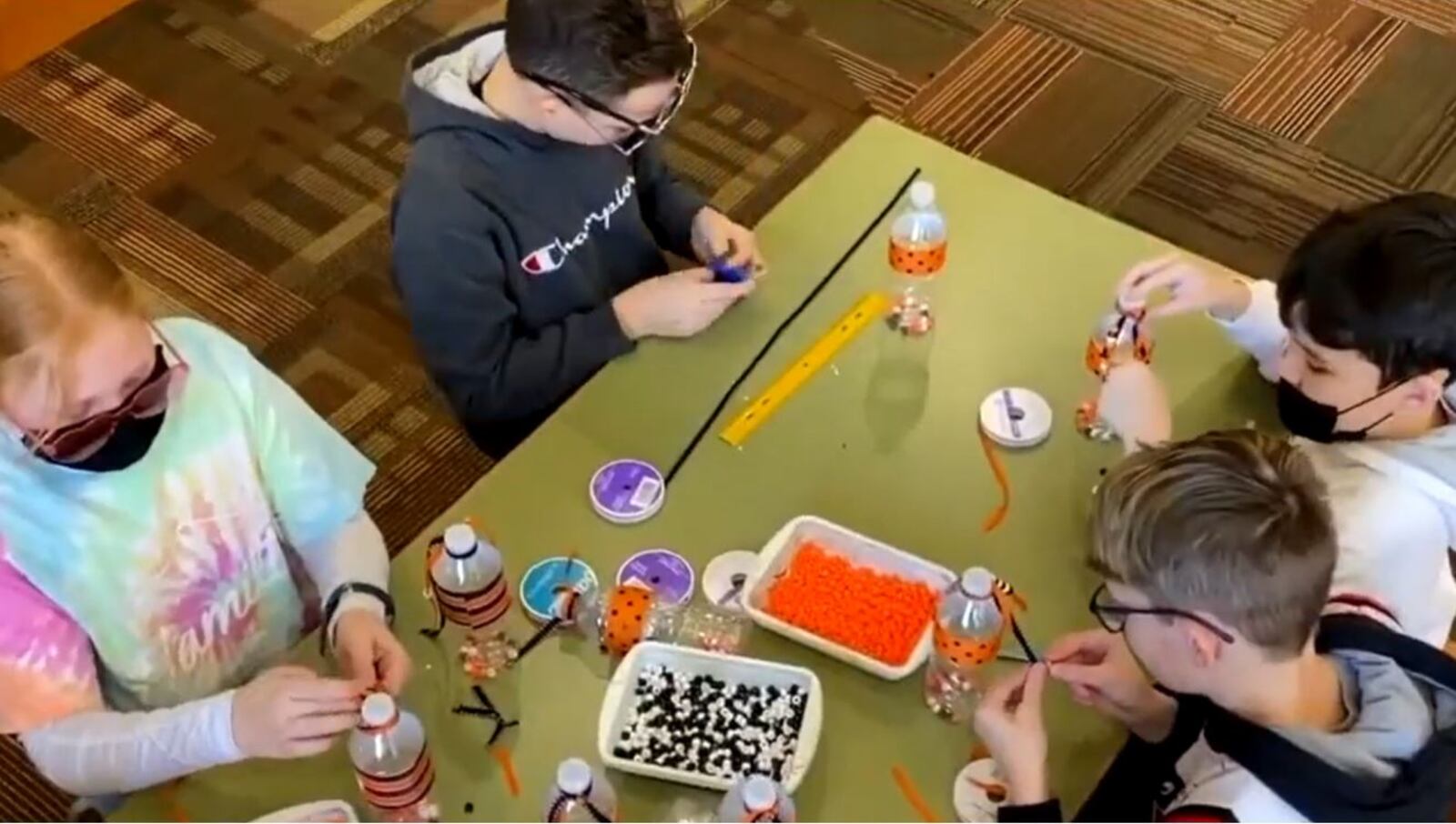 Students at Ridgeway Elementary work on projects to raise money for Bengals punter Kevin Huber's organization.