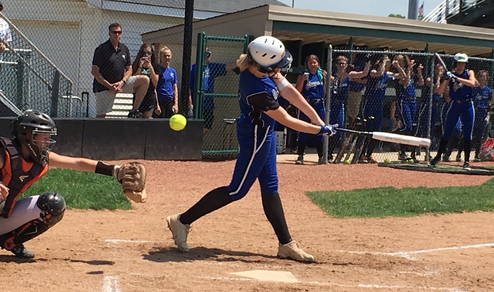 Cincinnati Christian’s Jenna Monk fouls a pitch off before it can get to Bradford catcher Elisa Martinez during Sunday afternoon’s Division IV district final at Mason. RICK CASSANO/STAFF