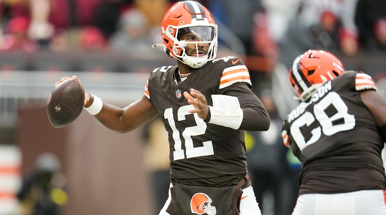 Cleveland Browns quarterback Shedeur Sanders (12) passes against the San Francisco 49ers during the second half of an NFL football game, Sunday, Nov. 30, 2025, in Cleveland. (AP Photo/Sue Ogrocki)