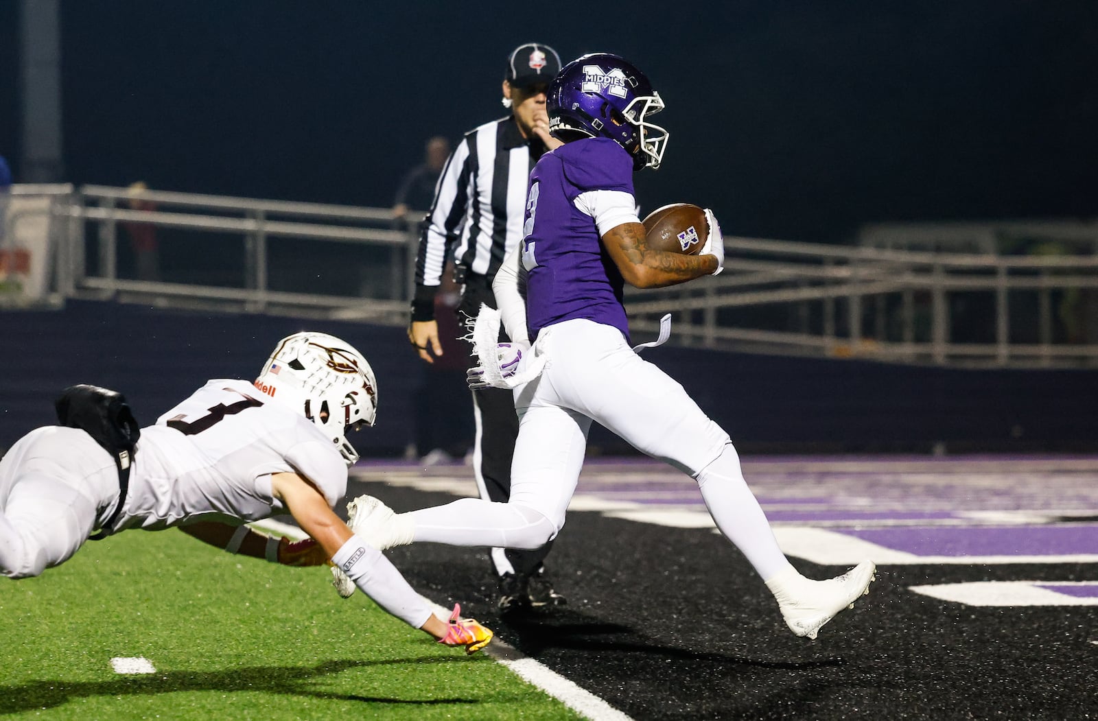 Middletown's Ace Cooper runs in for a touchdown during their playoff football game against Lebanon Friday, Nov. 7, 2025 at Barnitz Stadium in Middletown. The Middies won 31-0. NICK GRAHAM/STAFF