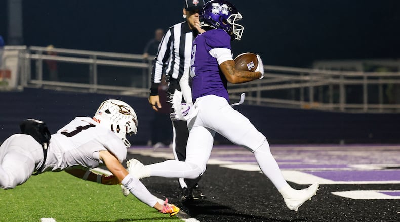 Middletown's Ace Cooper runs in for a touchdown during their playoff football game against Lebanon Friday, Nov. 7, 2025 at Barnitz Stadium in Middletown. The Middies won 31-0. NICK GRAHAM/STAFF
