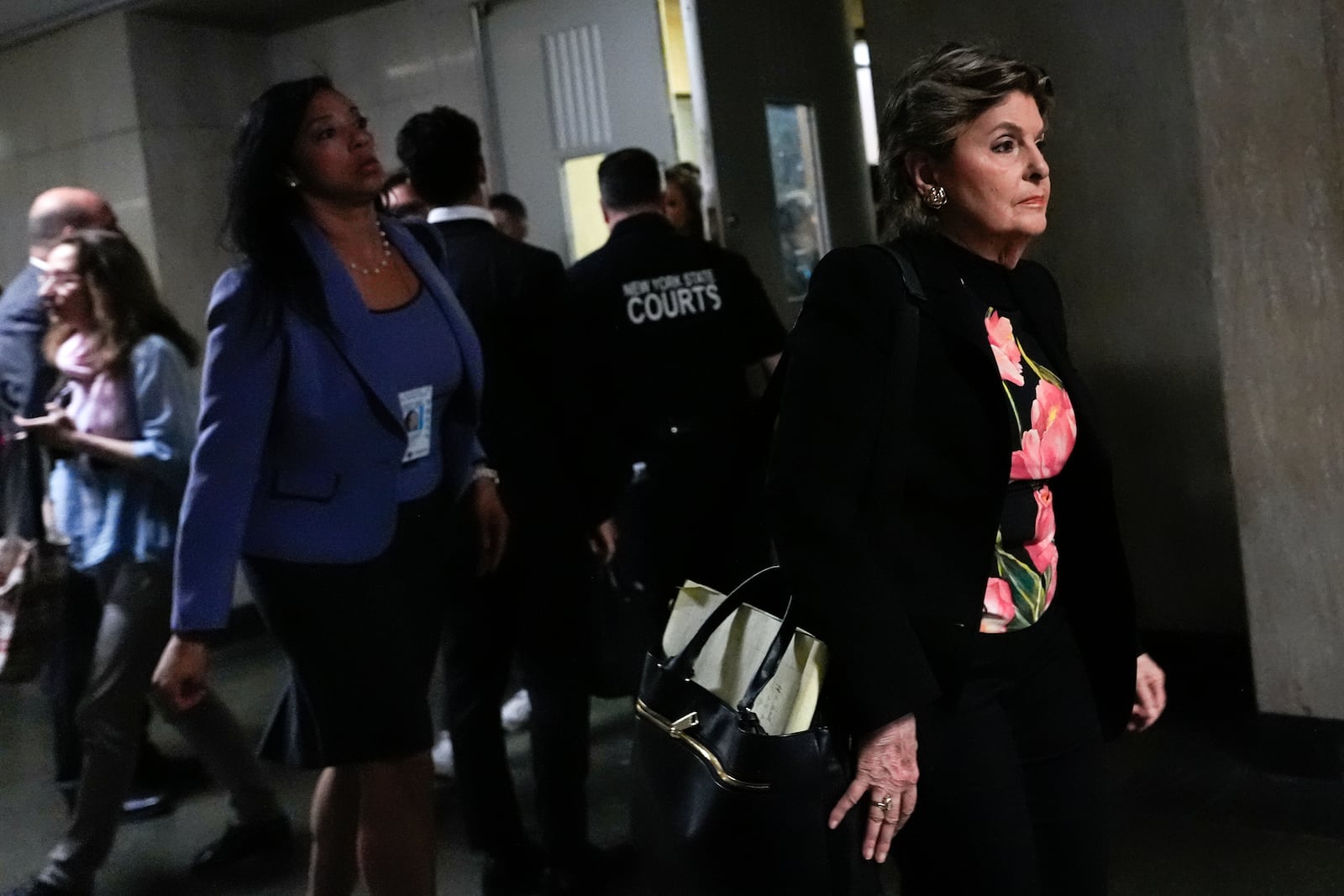 Attorney Gloria Allred leaves court for a break during Harvey Weinstein's retrial at Manhattan criminal court, Wednesday, April 23, 2025, in New York. (AP Photo/Julia Demaree Nikhinson)
