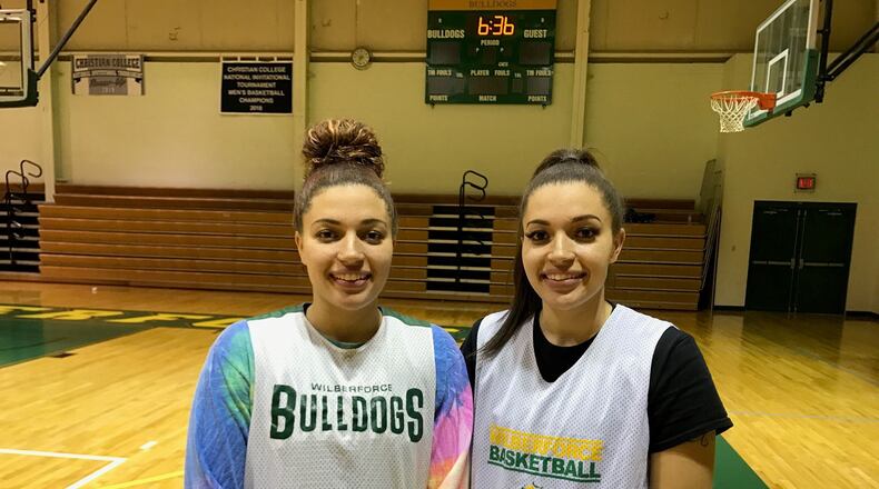 Alexis Shealey on left (rainbow sleeves) Alexandra Shealey on right after Wilberforce practice this past week. Tom Archdeacon/CONTRIBUTED