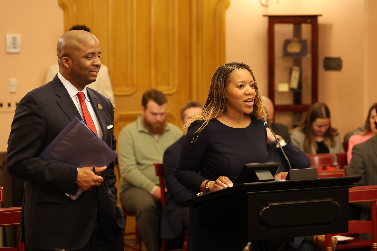 State Rep. Desiree Tims (D-Dayton) introduces House Bill 545, in regards to school busing, while co-sponsor Phillip Robinson Jr., D-Solon, looks on. Courtesy of Desiree Tims