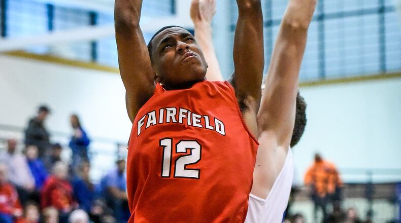 Fairfield’s Blake Spaulding goes up for a shot during the Indians’ game at Hamilton on Jan. 24, 2017. NICK GRAHAM/STAFF