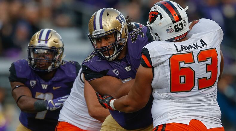 SEATTLE, WA - OCTOBER 22: Defensive lineman Vita Vea #50 of the Washington Huskies battles guard Gus Lavaka #63 of the Oregon State Beavers on October 22, 2016 at Husky Stadium in Seattle, Washington. (Photo by Otto Greule Jr/Getty Images)