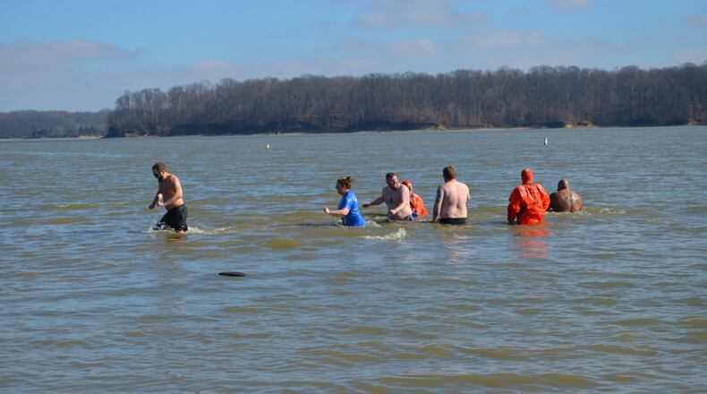 Members of the Department of Public Safety at Atrium Medical Center participated in a Polar Plunge Feb. 3 at Caesar Creek State Park in Warren County. The event raised $33,000 for Special Olympics and the Atrium group raised $820. SUBMITTED PHOTO
