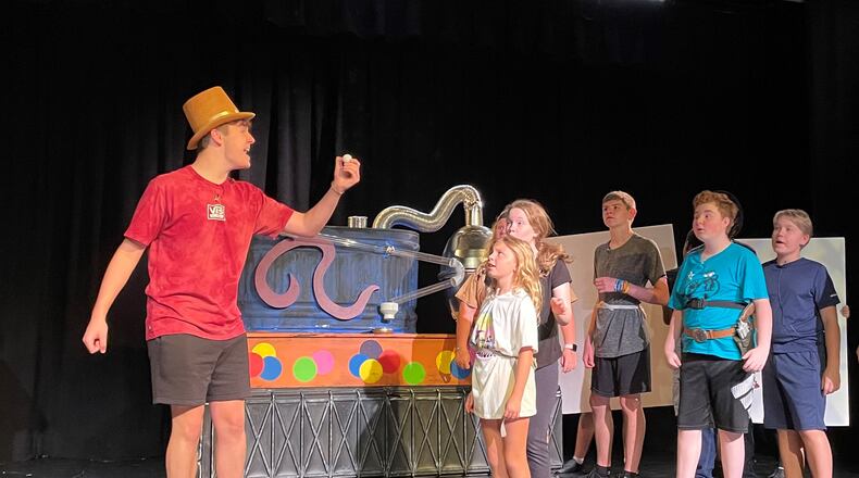 Performing Arts Academy will bring six performances of “Willy Wonka Junior” to the stage in Middletown. The show opened Friday and will run over two consecutive weekends, through Sun., July 31. (Pictured are some of the cast members rehearsing for the show.) CONTRIBUTED