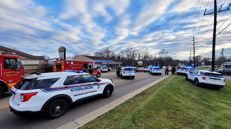 A short chase of a reported stolen vehicle Friday in Middletown ended in a crash  on South Dixie Highway and one person in custody. NICK GRAHAM/STAFF