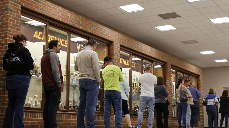 Voters wait in line to cast their ballots on Election Day Tuesday, Nov. 8, 2022 at Ross Middle School. NICK GRAHAM/STAFF